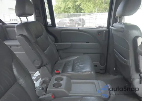 2010 Honda Odyssey Ex-L z USA, uszkodzony, nr VIN 5FNRL3H77AB053699